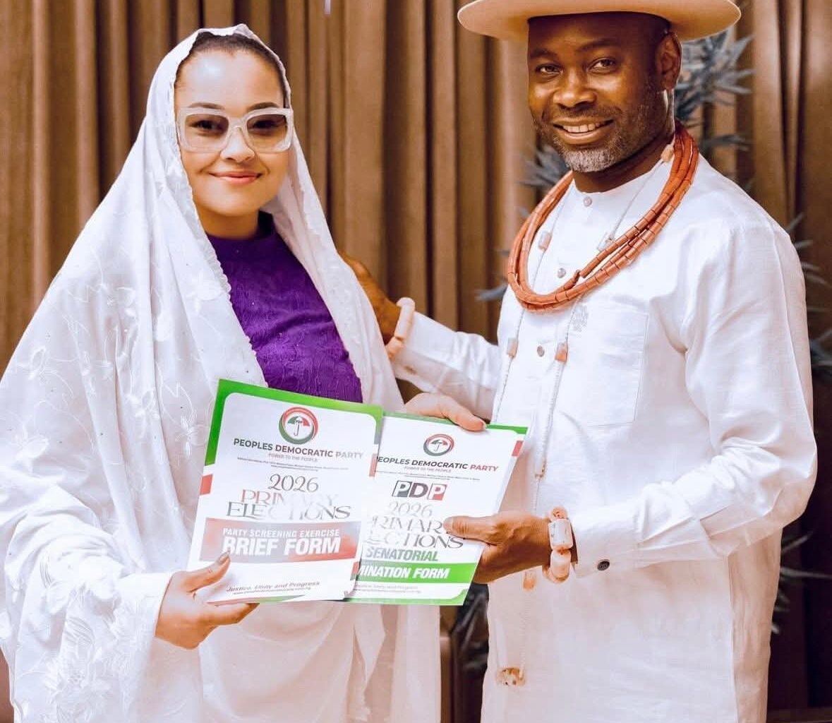 Natasha Akpoti and her husband